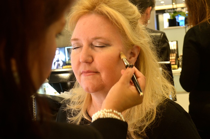 Rona Mathura gives Andrea Pastor a makeover at Saks Fifth Avenue.