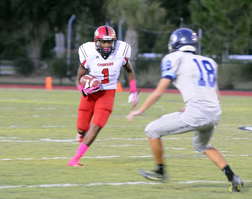 Cardinal Mooney wide receiver Blair Perry scored the Cougars first two touchdowns on catches of 20 and 14 yards.