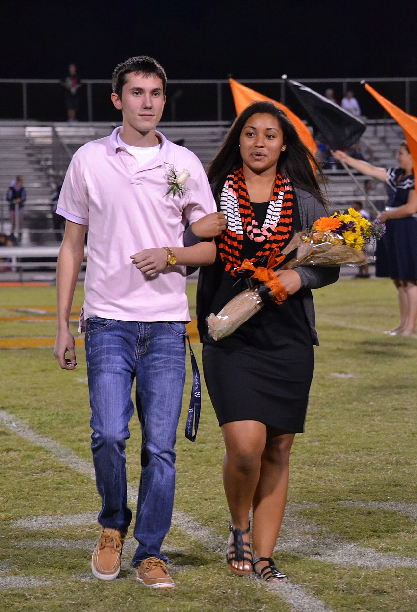 Lucas Beierlein escorts Sydni Battie.