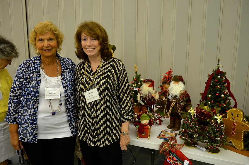 Donna Winter and Eileen Devine admire the seasonal decorations.