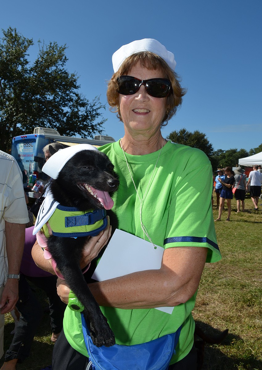 Cathy Marine and Scooter match dressed as sailors.