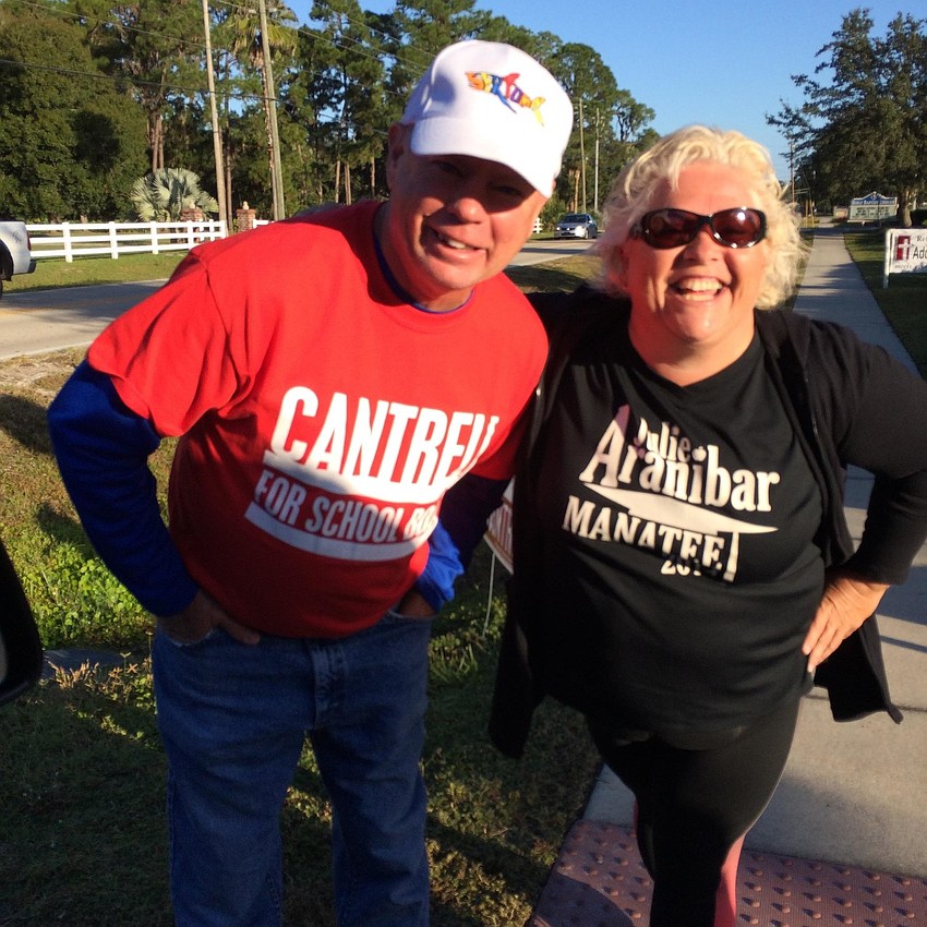 Former Superintendent Tim McGonegal and School Board Chairwoman Julie Aranibar share laughs.
