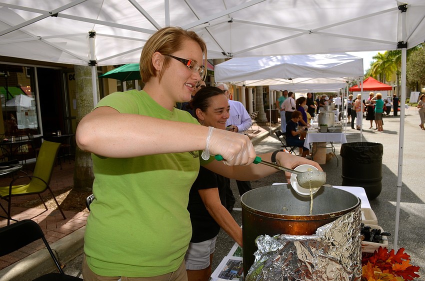 Jami Rowell, of Linger Lodge, dishes out soup to patrons.