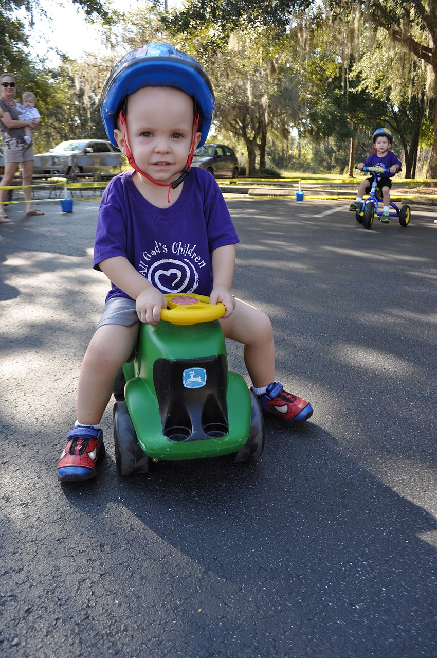 Carter Eddy rides with a Spiderman helmet.