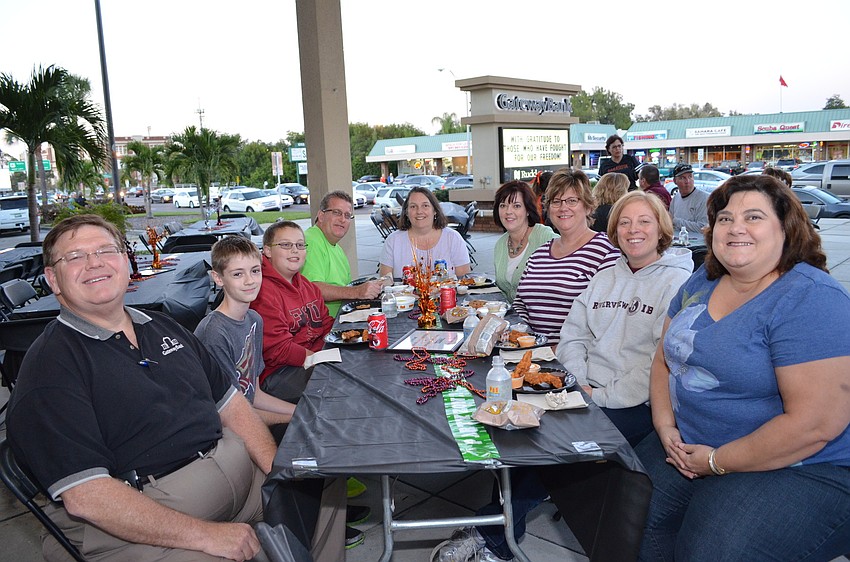 Riverview High School Kilty Band parents and family members tailgating before the game against Sarasota High School.