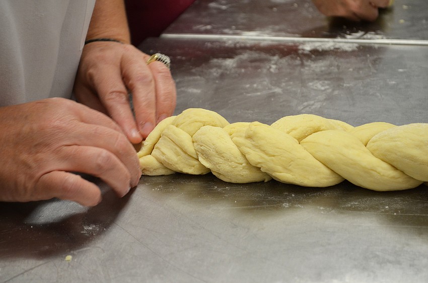 A Challah braid is made with three strands of dough.