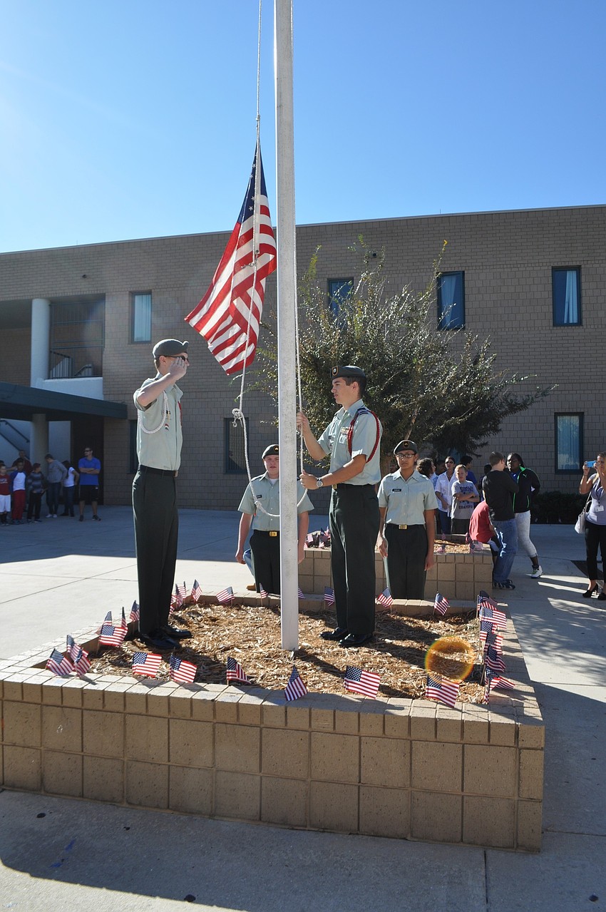 Members of the Lakewood Ranch High School JROTC program raised the flag.