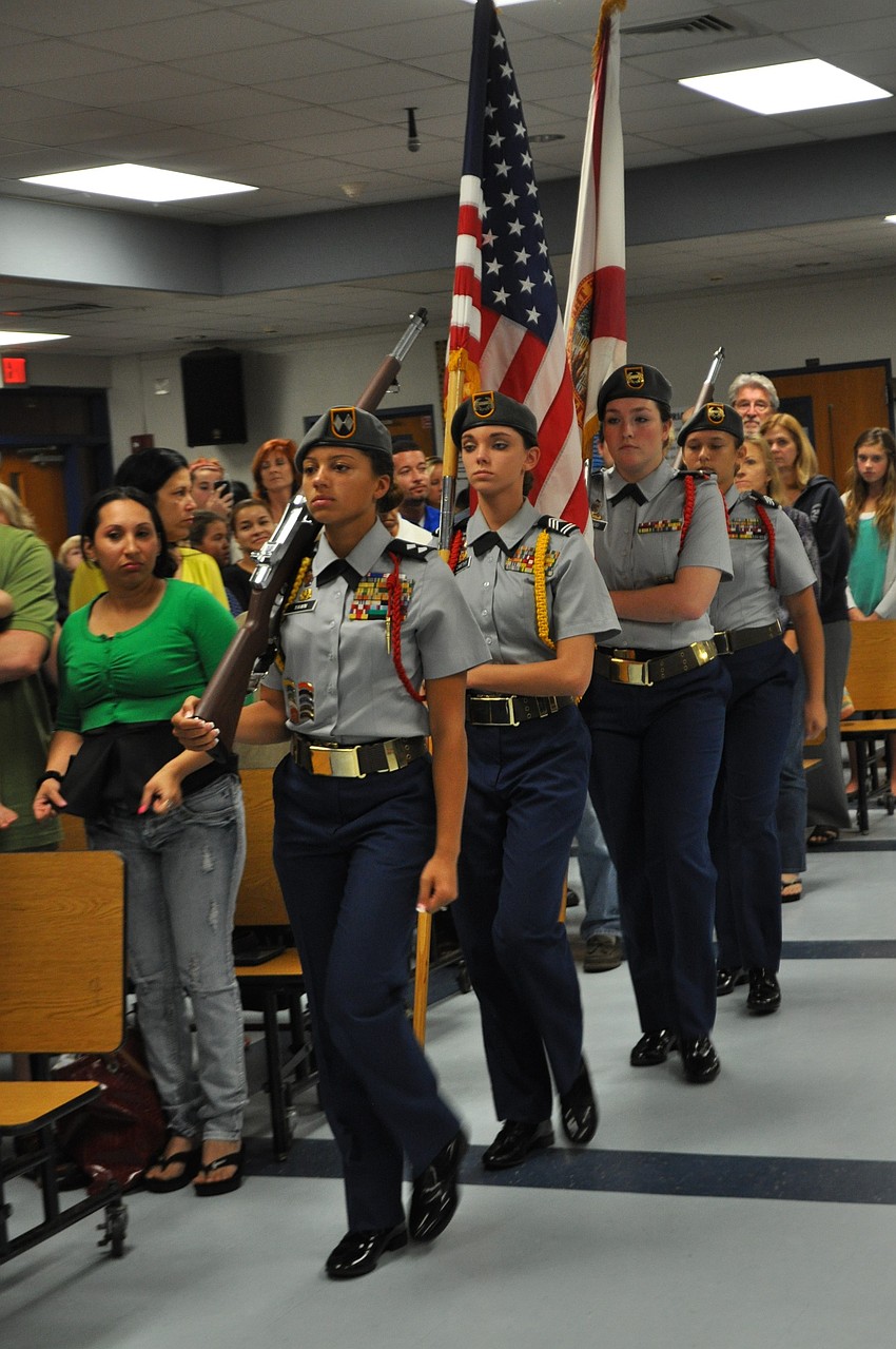 Members of Braden River High Schoolâ€™s JROTC Honor Guard present the colors at the start of the ceremony.