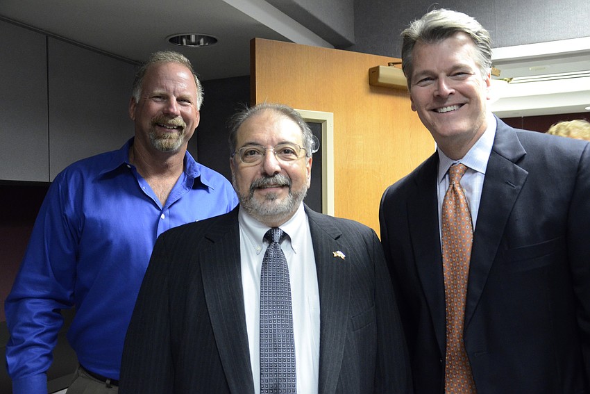 Jim Gabbert, County Commissioner Alan Maio and Bill Merrill.