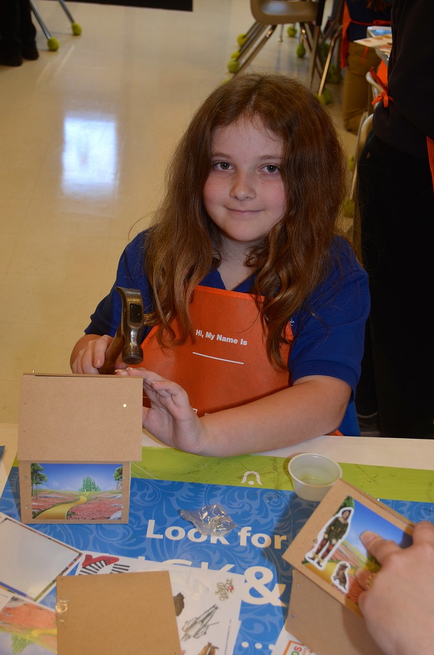 Emma Speche shows off her finished product.