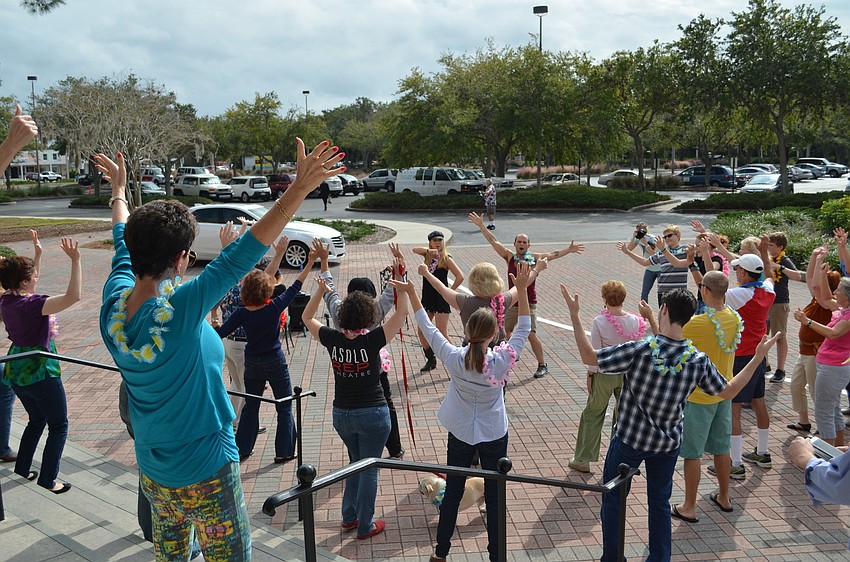 Meggie Cansler and Ryan Cavanaugh walk the crowd through the choreography.