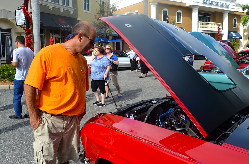 Sam Strickland admires a '69 Mach 1.