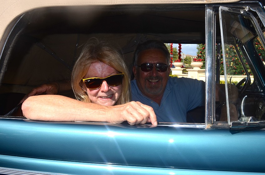 Elizabeth and Bruno Motta show off their '44 Convertible.