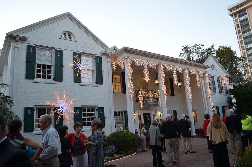 The Christy Payne Mansion was decorated with lights on the outside and inside to celebrate the season.