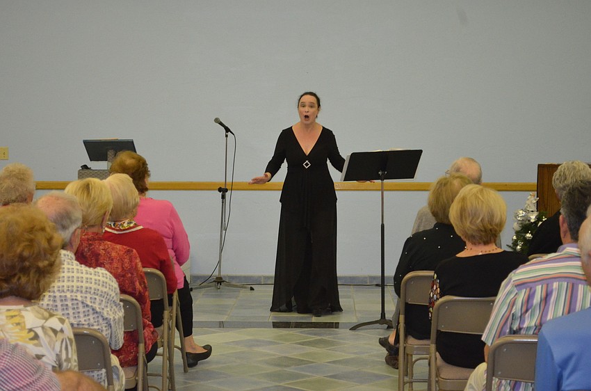 Michelle Giglio sings arias and Christmas carols.