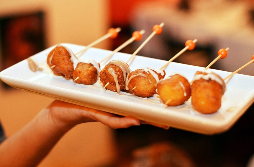 Guests enjoyed hors dâ€™oeuvres before sitting down for a 4-course dinner prepared by the celebrity chefs.