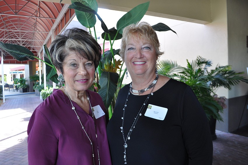 Linda Tercyak and Mary Beth Steffens welcome guests.