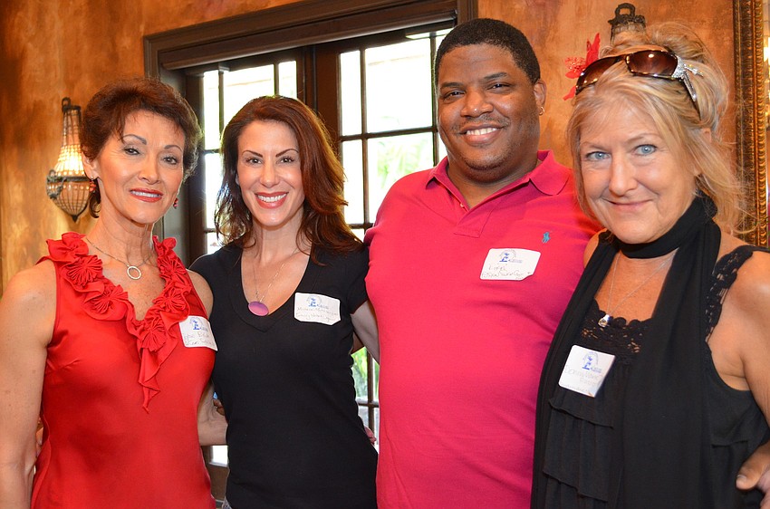 Employees of Fusion SkinCare & BodyWorks, Elyse Bylep, Michelle Mattison, Ricardo Dixon and Donna Marie Thorson.