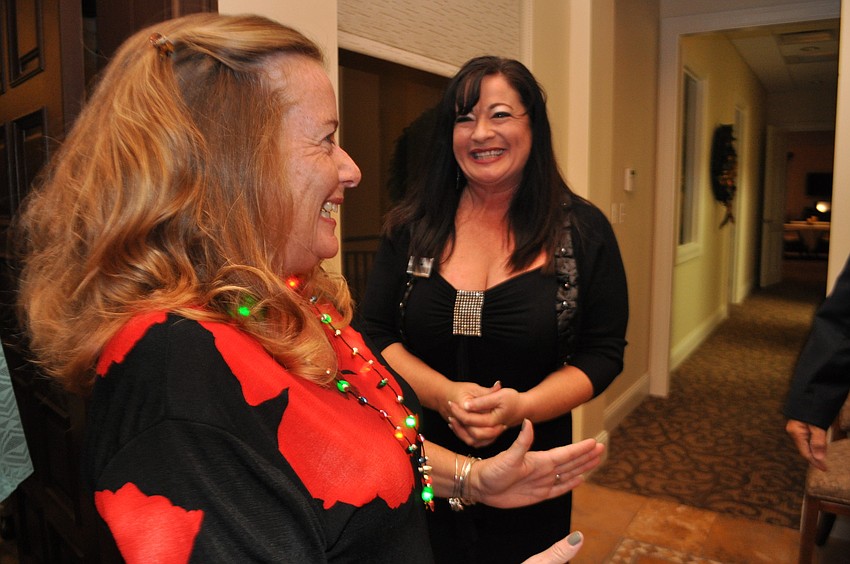 Barbie Brand greets club manager Kara Oâ€™Neill with excitement.