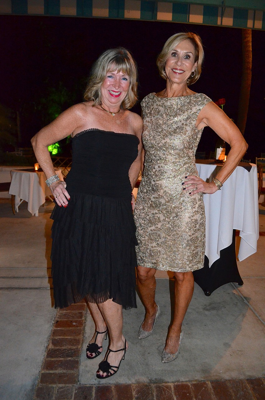 Pam Yulke and Kay Cirillo show off their formal attire.