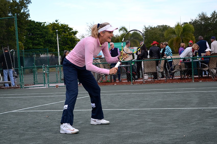 Nina Schmidt braces for a serve by her opponent.
