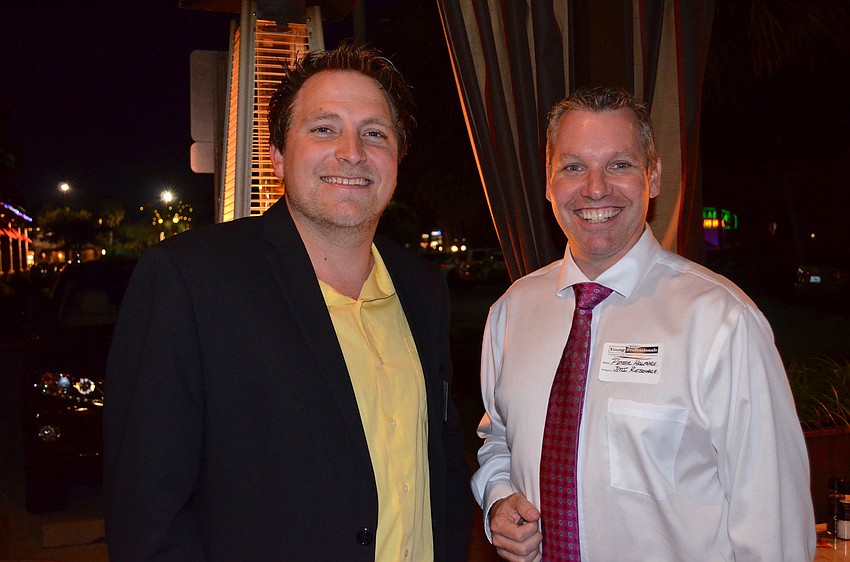 Jason Wilkins and Peter Halpern make new contacts.