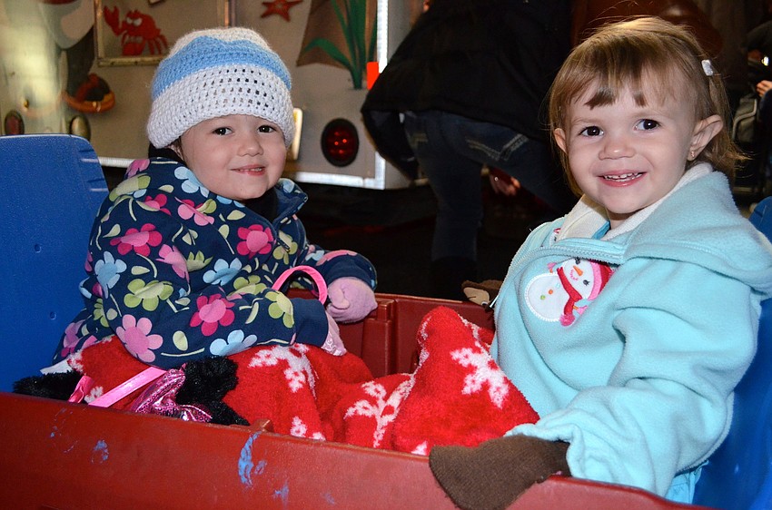 Shelby and Aubrey Scarbrough relax in their wagon.
