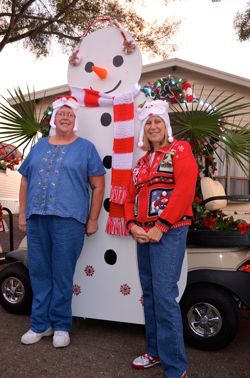 Sisters Ann Herbert and Beverly Collins show off their winter wonderland.