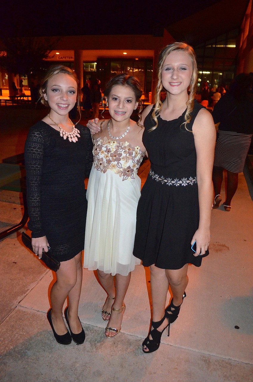 Peyton Welter, Chloe Ojeda and Olivia Andrews show off their formal wear.