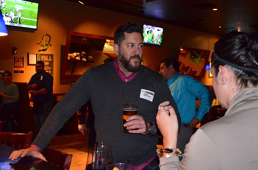 Scott Leavitt jokes with friends.