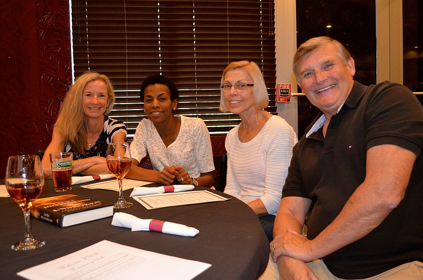 Mary Quinn, Regina Morris and Joan and Terry Novak wait for their meals to arrive.
