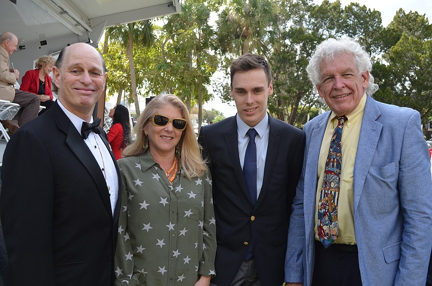 Master of Ceremonies Chuck Sidlow, board member Joan Galvin, Louis Ducruet and ceremony coordinator Brian Liddicoat