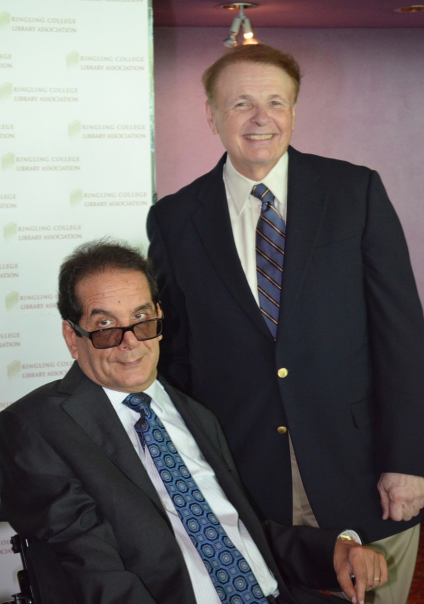 Charles Krauthammer and Larry Thompson, president of Ringling College of Art and Design.