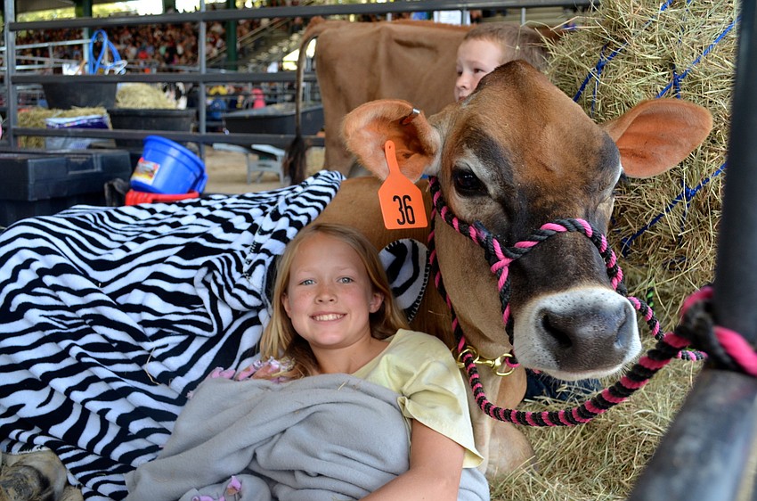 Twelve-year-old Jamie Saturky relaxes with Leah.