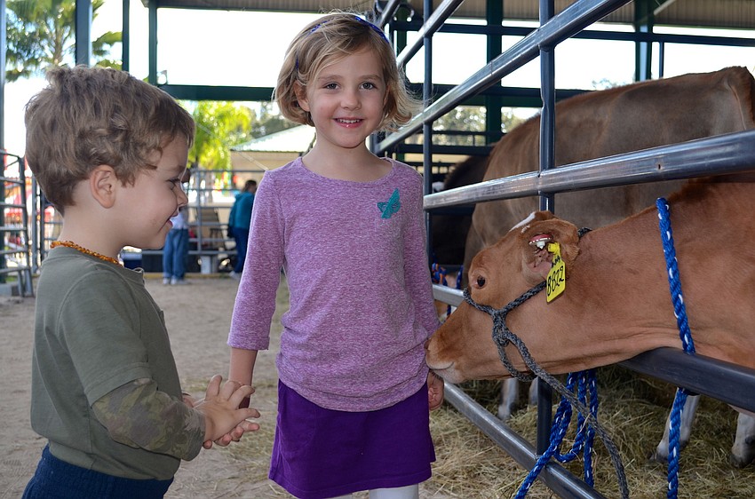 Jackson and Emma Minor enjoy meeting the animals.