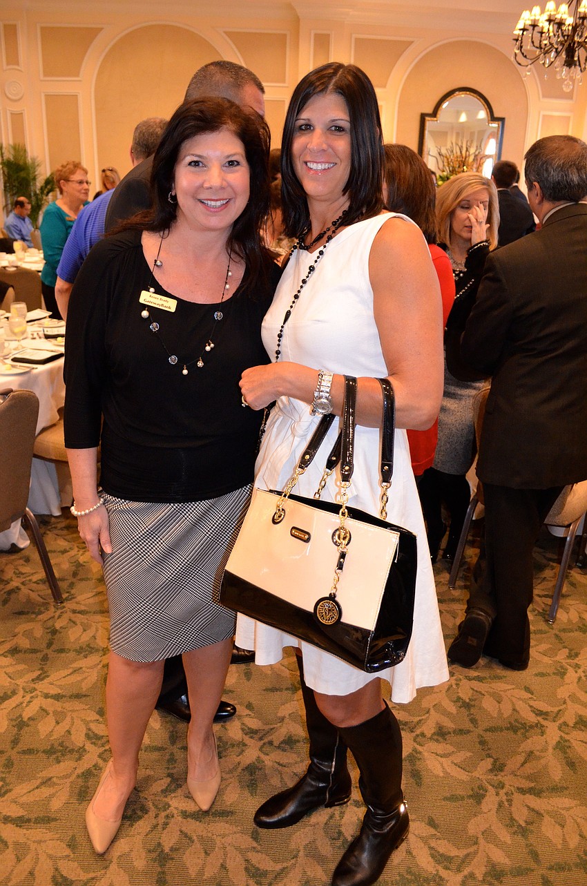 Renee Brady and Julia DeCastro show off their outfits.