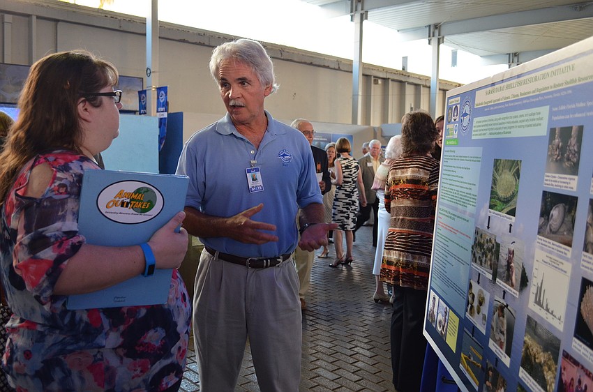Senior scientist Jim Cutler presents explains a shellfish restoration initiative.