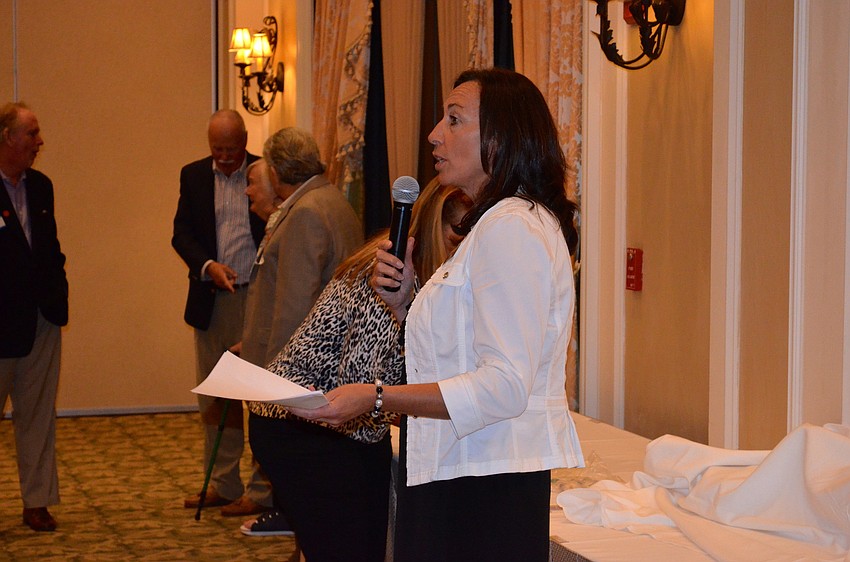 Lori Basilone announces the award winners.