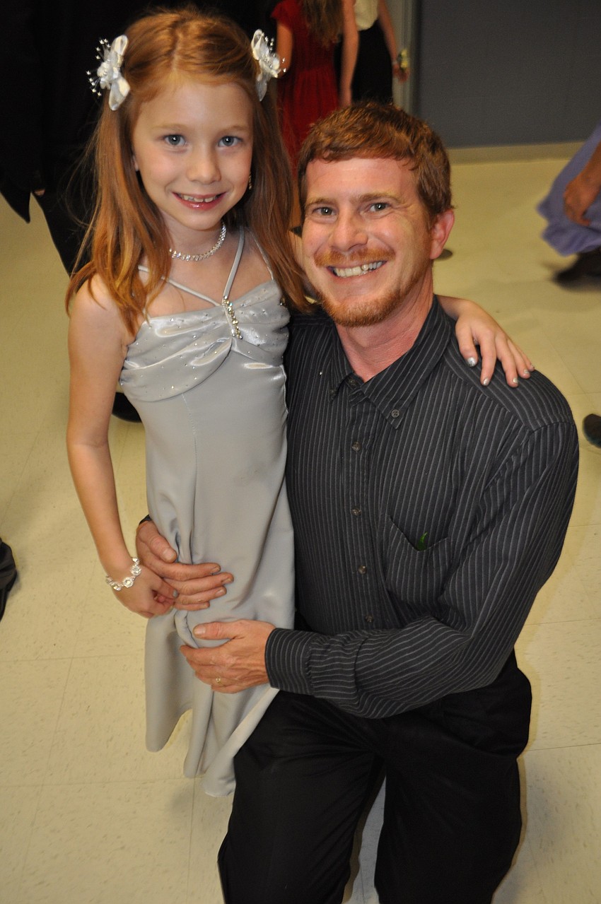 Gracie Pasick-Gerdeman, 7, hits the dance floor with her dad, Michael Gerdeman.