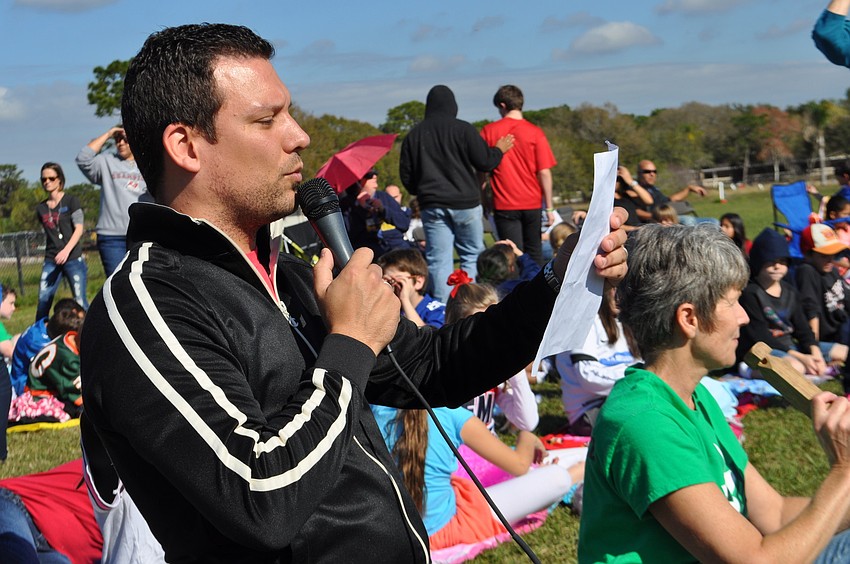 Jeff McCauley, a computer teacher, announces the questions.