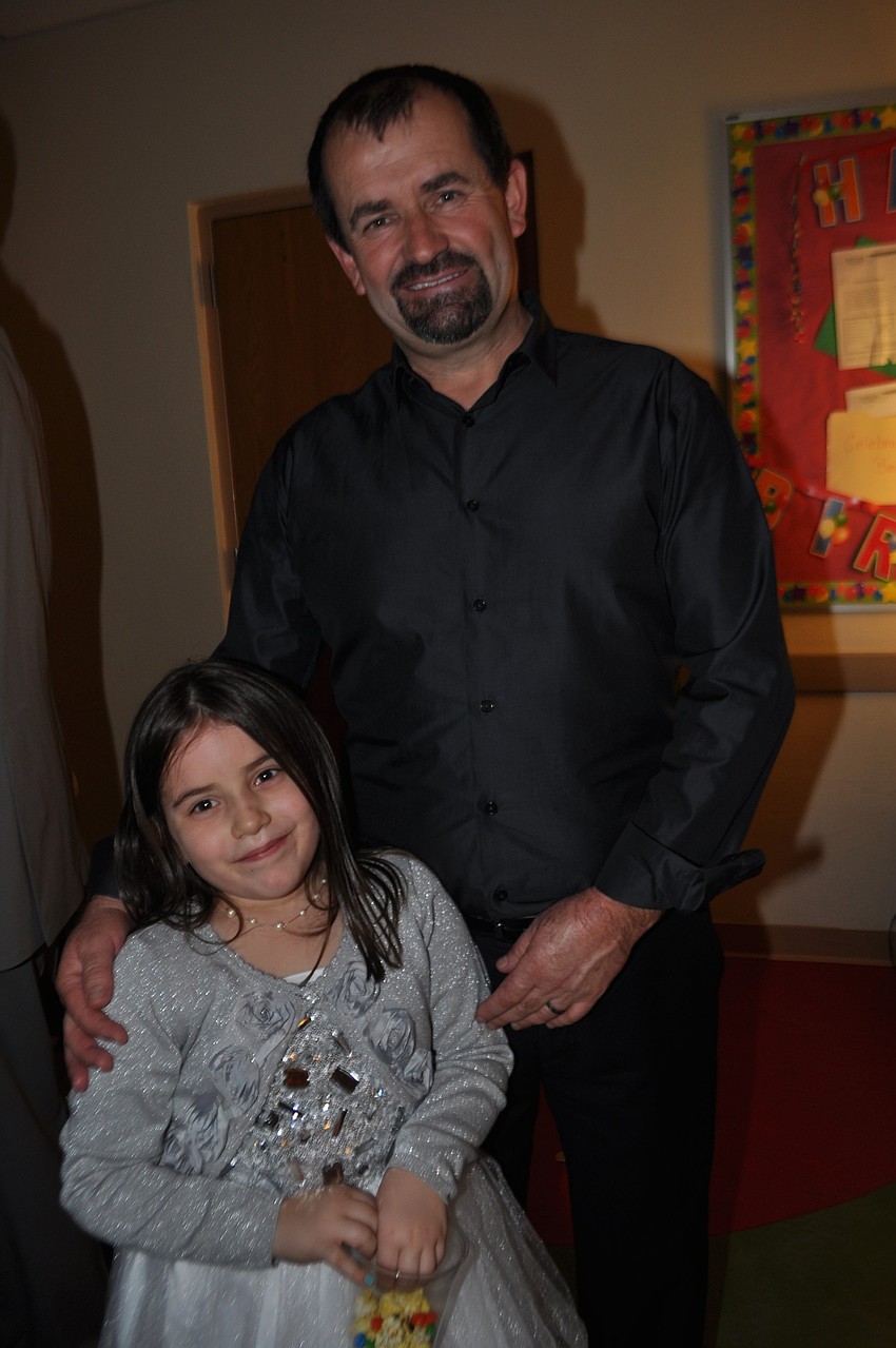 Adriana and Jack Desa wait to have their photo taken.