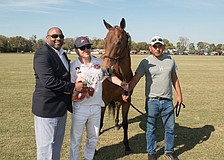 James P. Uihlein's horse, LIttle Goose, receives the Best Playing Pony Award. Courtesy photos