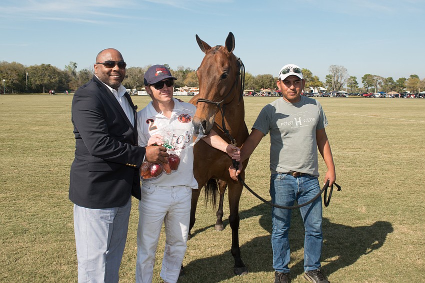 James P. Uihlein's horse, LIttle Goose, receives the Best Playing Pony Award. Courtesy photos