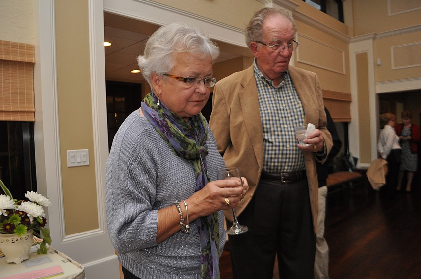Sandy and Bill Heerman check out a zebra painting.