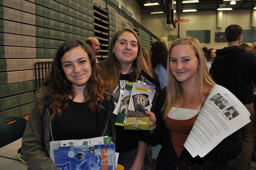 Aliyah Hurt, Kaley Gee and Emilee Spencer, sophomores, check out colleges.