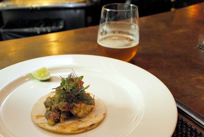 Second course: Yuzu-butter poached lobster taco paired with â€˜Invasion Pale Aleâ€™