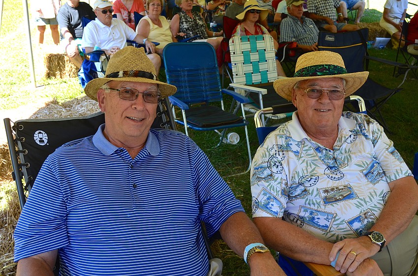 Gerry Moore and Dennis Larson dress for the occasion.