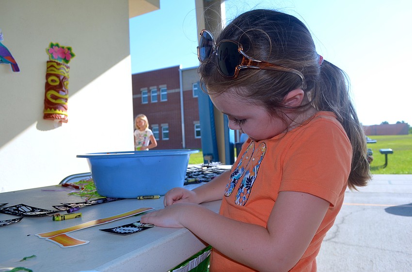 Emily Fay enjoys a minute alone for coloring.