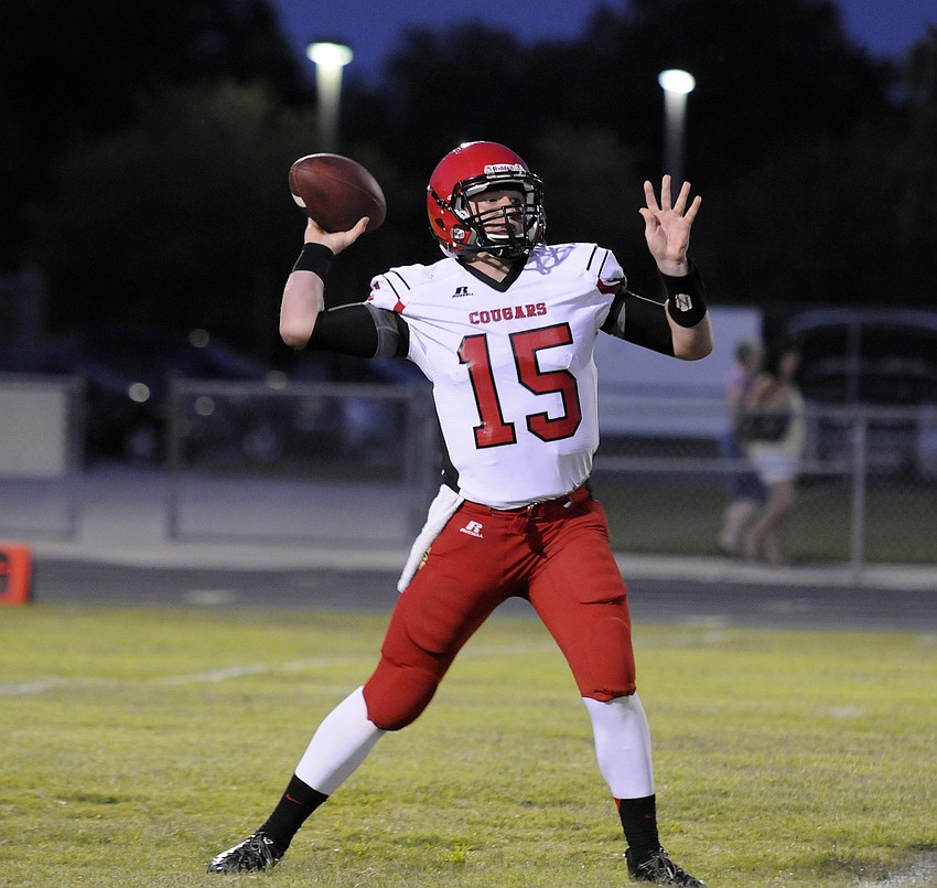 Cardinal Mooney quarterback Reese Vita attempts a pass in the second half.