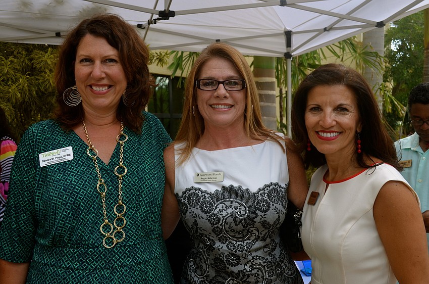 Denise Pope, Angie Kaleskas and Violeta Huesman socialize during the event.